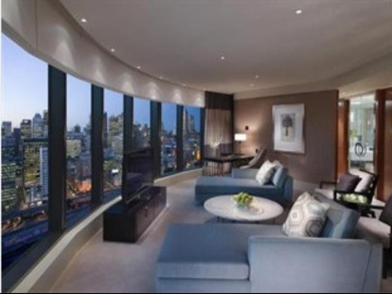 فندق Crown Towers ملبورن المظهر الخارجي الصورة The living room of a typical apartment